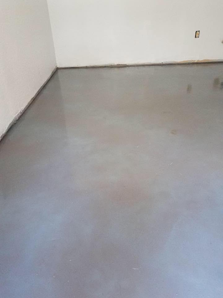 Finished glossy gray epoxy floor coating